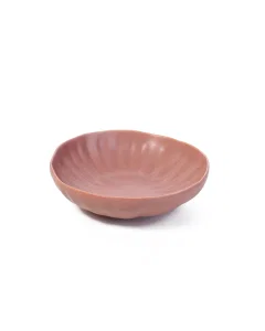 A deep red porcelain dish