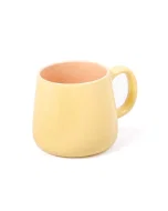 Yellow porcelain cup