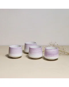 A set of 4 pink porcelain cups