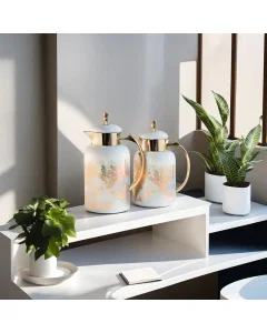 A set of 2 pieces of gold-plated, light gray chrome thermos