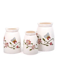 A set of 3-piece porcelain storage boxes with a rose pattern
